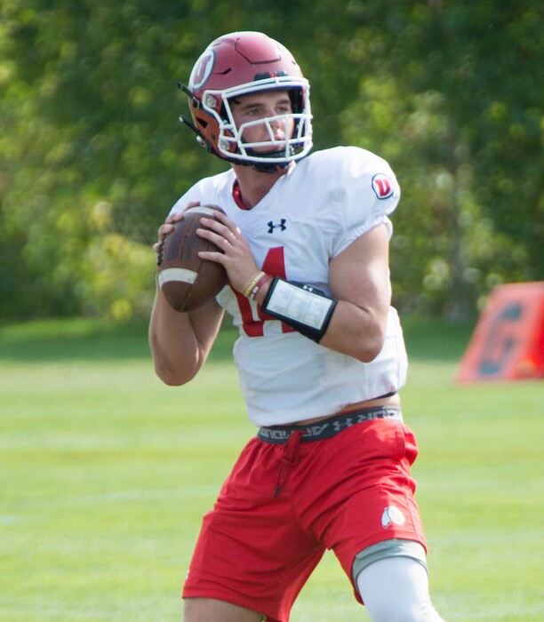 (Rick Egan  |  The Salt Lake Tribune)    Ute quarterback Jack Tuttle looks for a receiver down field during practice, Friday, Aug. 3, 2018.