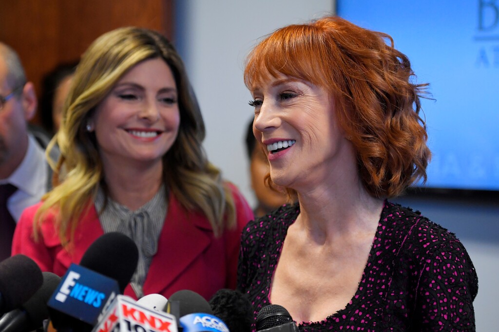 Comedian Kathy Griffin, right, speaks along with her attorney Lisa Bloom during a news conference, Friday, June 2, 2017, in Los Angeles, to discuss the backlash since Griffin released a photo and video of her displaying a likeness of President Donald Trump's severed head. (AP Photo/Mark J. Terrill)