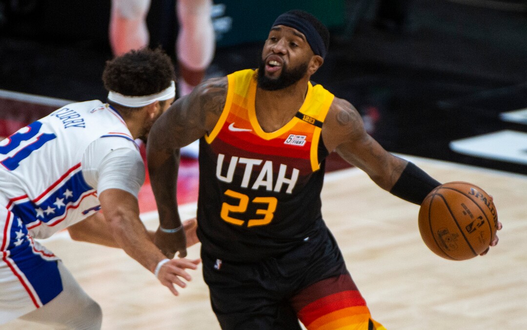 (Rick Egan | The Salt Lake Tribune) Utah Jazz forward Royce O'Neale (23) is fouled by Philadelphia 76ers guard Seth Curry (31) after stealing the ball, in NBA action between the Utah Jazz and the Philadelphia 76ers at Vivint Arena, on Monday, Feb. 15, 2021.