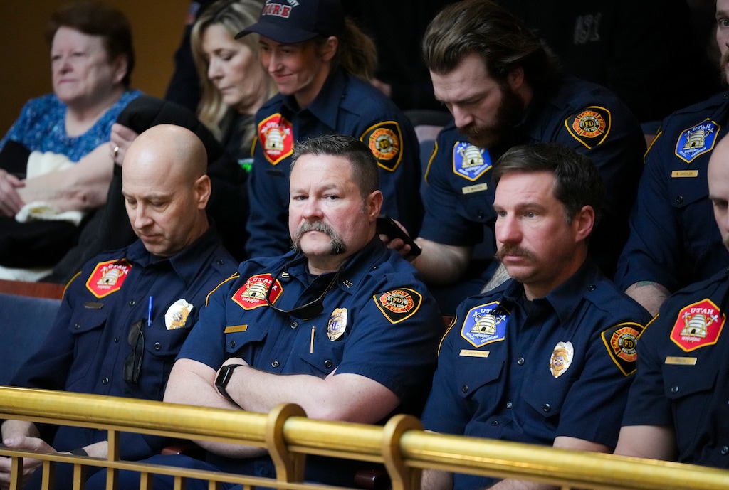 (Bethany Baker  |  The Salt Lake Tribune) Salt Lake City firefighters gather in the Senate gallery as lawmakers postpone action on HB267 at the Capitol in Salt Lake City Friday, Jan. 31, 2025.