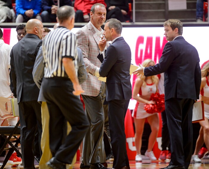 (Steve Griffin  |  The Salt Lake Tribune) Utah head coach Larry Krystkowiak and his coaching staff huddle on the court during a time out during game against the Arizona State Sun Devils at the Huntsman Center on the University of Utah campus in Salt Lake City Sunday January 7, 2018.