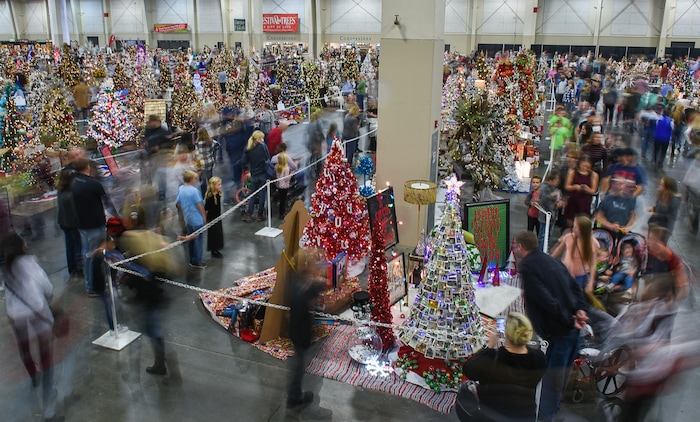 (Francisco Kjolseth  |  The Salt Lake Tribune)  People tour the Festival of Trees at the South Towne Exposition Center in Sandy on Friday, Dec. 1, 2017. The annual festival which runs through Saturday raises money for children at Primary Children's Hospital.