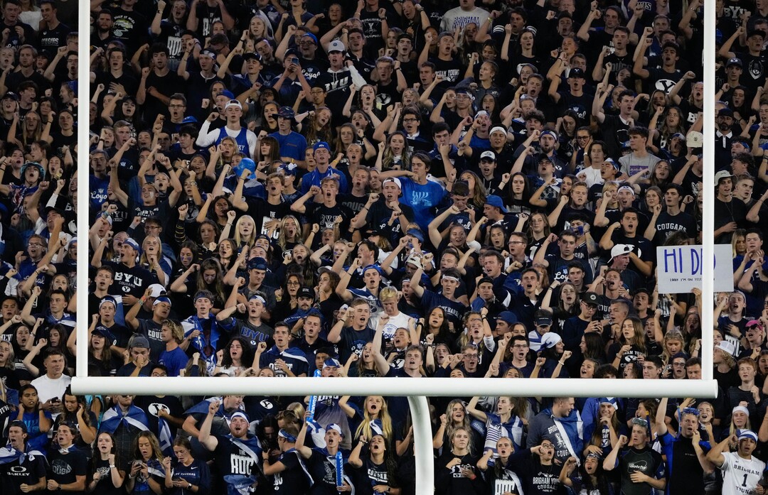 (Francisco Kjolseth | The Salt Lake Tribune) The BYU student section erupts in cheer as the Brigham Young Cougars take on the South Florida Bulls at LaVell Edwards Stadium in Provo, Saturday, Sept. 25, 2021.