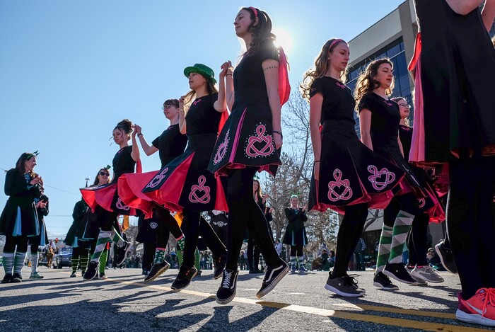 (Francisco Kjolseth | The Salt Lake Tribune) Members of the An Dragan Ceilteach Irish Dancers jump and dance as Salt Lake CityÕs Irish community celebrates their 41st annual St. PatrickÕs Day Parade with crowds lining up to take in the festivities. Marching bands, Irish dancers, bagpipes and a sea of green moved along 200 South, starting at 500 East Saturday morning en route to State street where the Siamsa festivities kept the fun going at the Gallivan Center.