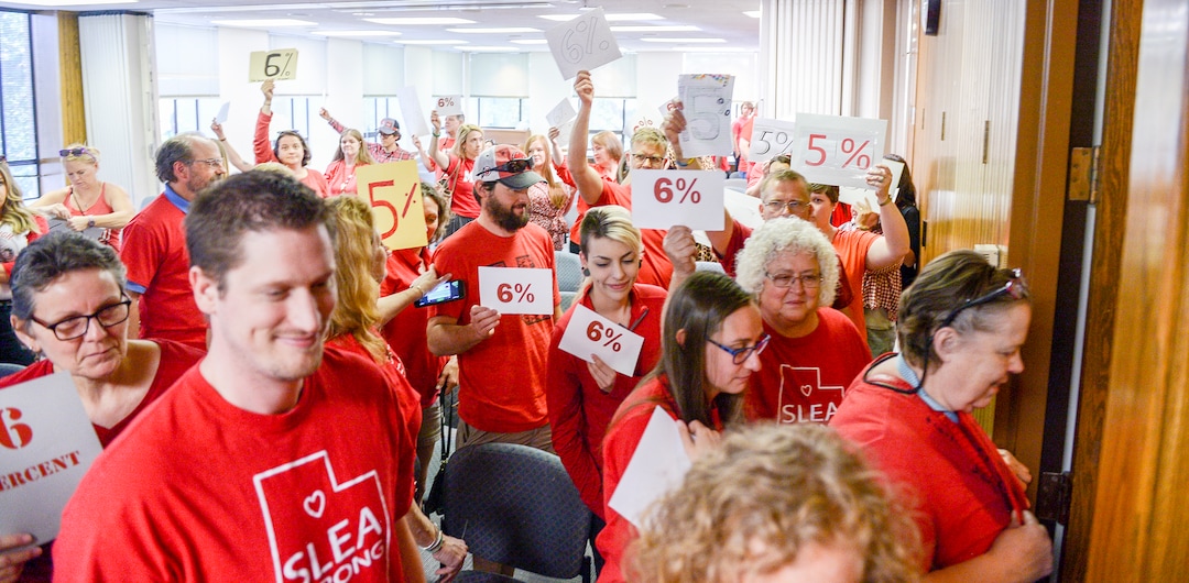 (Leah Hogsten  |  The Salt Lake Tribune) Teachers walk out of the public comment period at the Salt Lake City School District meeting regarding salary negotiations, June 4, 2019. More teachers are leaving Utah classrooms and one of the biggest reasons they cite is low pay. The state now has a shortage of 1,600 educators with the imbalance expected to get worse.