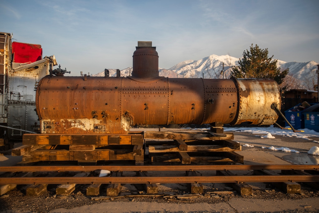 (Ben Dorger | Standard-Examiner via AP) The Denver and Rio Grande Western Railroad locomotive No. 223 is seen outside Union Station in Ogden, Utah on Tuesday, Dec. 10, 2019. The 138-year-old historic train sits in pieces, consigned to limbo after a local restoration effort was frozen out.