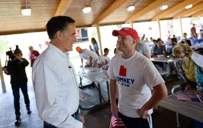 (Francisco Kjolseth | The Salt Lake Tribune) The Romney campaign hosts "Mondays With Mitt" at Veterans Memorial Park in West Jordan on Monday, June 18, 2018 as senate candidate Mitt Romney speaks with Chris Hoskins of Provo and other supporters gathered at the park.