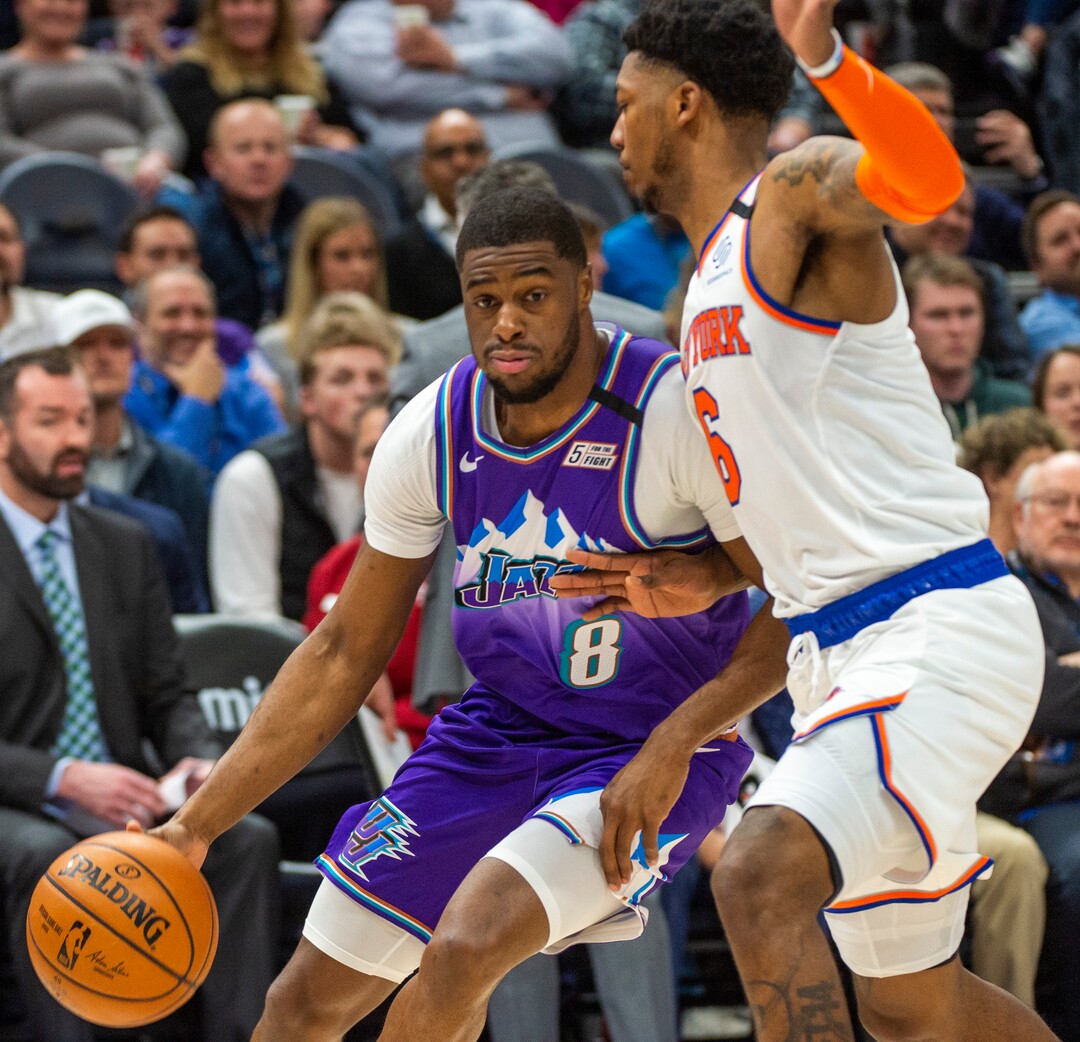 (Rick Egan  |  The Salt Lake Tribune) Utah Jazz guard Emmanuel Mudiay (8) works the ball inside, as New York Knicks guard Elfrid Payton (6) defends, in NBA action between the Utah Jazz and the New York Knicks, in Salt Lake City, Wednesday, Jan. 8, 2020.