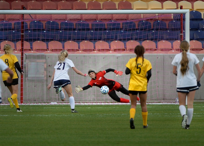 (Scott Sommerdorf   |  The Salt Lake Tribune)   Maple Mountain goalkeeper Kayla Thompson makes a save during first half play. Maple Mountain won the shootout period after double overtime to win the 5A championship game over Timpanogos, Friday, October 20, 2017. 