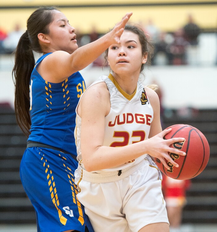 (Rick Egan  |  The Salt Lake Tribune)   Jazzlynn Parry (23) tries to get around her Judge Memorial defender, in 3A Women's basketball State playoff action Judge Memorial vs. San Juan, in Heber City, Friday, Feb. 16, 2018.