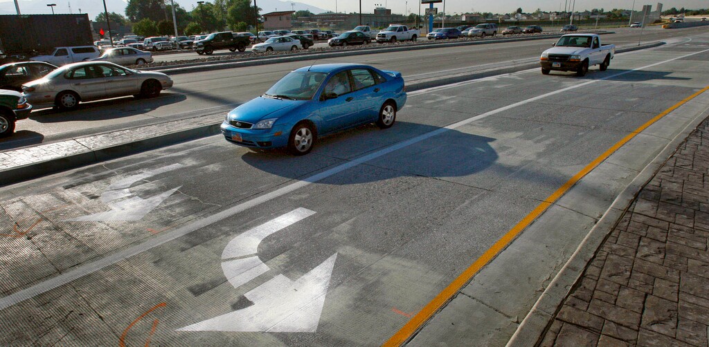 New left turn lanes on Bangerter Highway at 3500 south have motorists crossing several oncoming lanes before they get to the actual intersection. UDOT is implementing the lanes to help with traffic flow. Steve Griffin/The Salt Lake Tribune 09/17/07