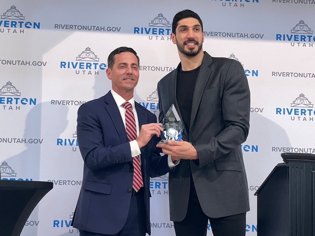 (Alex Vejar | The Salt Lake Tribune) Enes Kanter Freedom, right, accepts the Freedom Award from Riverton Mayor Trent Staggs on Wednesday, April 12, 2023, at the Old Dome Meeting Hall in Riverton, Utah.
