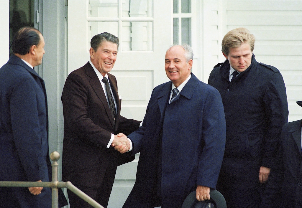 FILE - In this Oct. 11, 1986 file photo, President Ronald Reagan shakes hands with Soviet Leader Mikhail Gorbachev in Reykjavik, Iceland.  Although the moment, protagonists and locations become enshrined in history books, major summits hold no guarantee of further progress. In some cases, the summit is as good as it gets as relations remain stagnant or plummet further.   (AP Photo/Ron Edmonds, File)