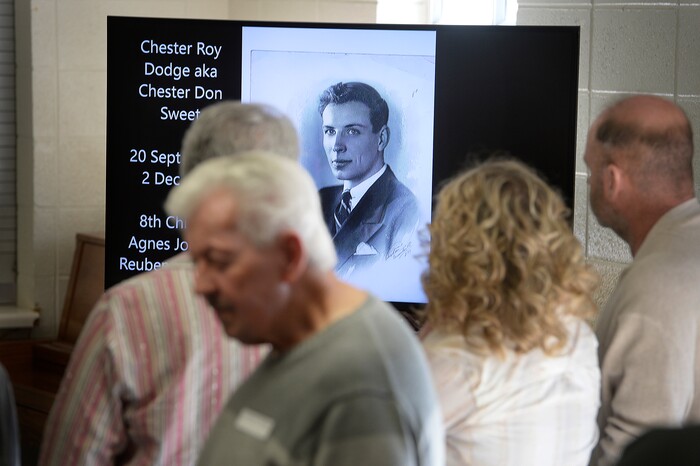 (Scott Sommerdorf | The Salt Lake Tribune) An old family photo of Chester Roy Dodge aka Chester Don Sweet is displayed as part of a slide show playing as newly connected families gathered for a reunion, Thursday, November 9, 2017 at the Bountiful Tabernacle.