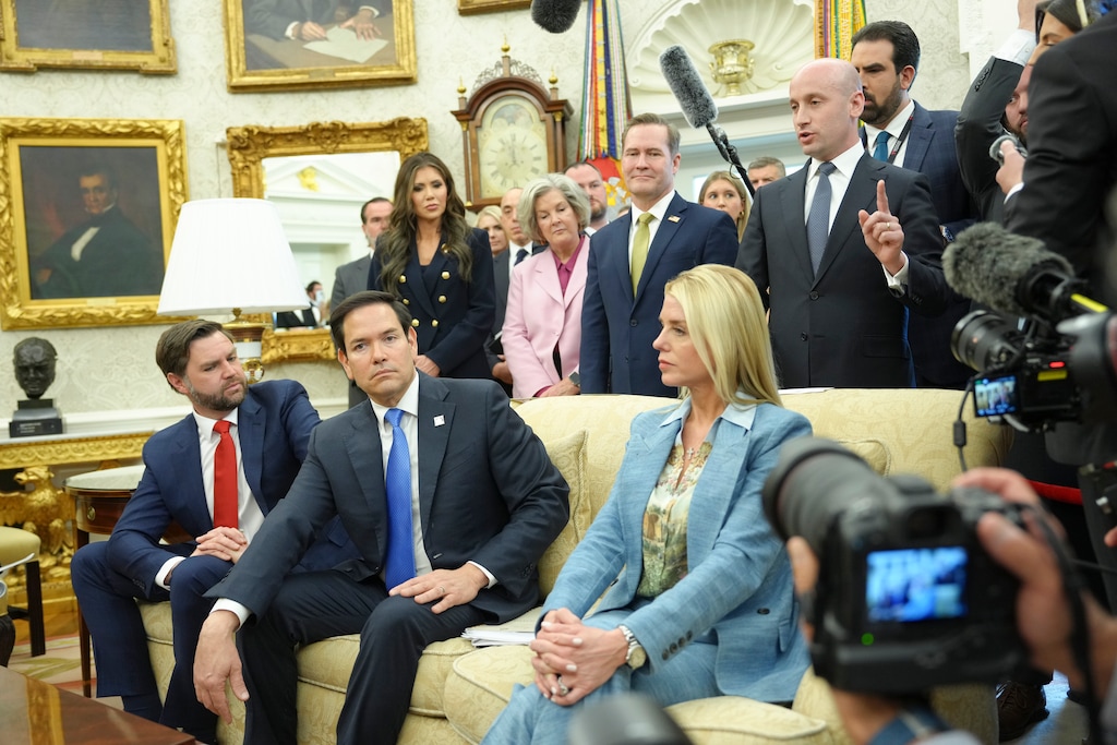 (Eric Lee | The New York Times) Stephen Miller, right, the deputy White House chief of staff, speaks as President Donald Trump meets with President Nayib Bukele of El Salvador in the Oval Office of the White House in Washington, on Monday, April 14, 2025. President Trump met with President Bukele as the administration ramps up its use of a notorious Salvadoran prison for holding migrants deported by the U.S. Seated from left: Vice President JD Vance, Secretary of State Marco Rubio, Attorney General Pam Bondi.