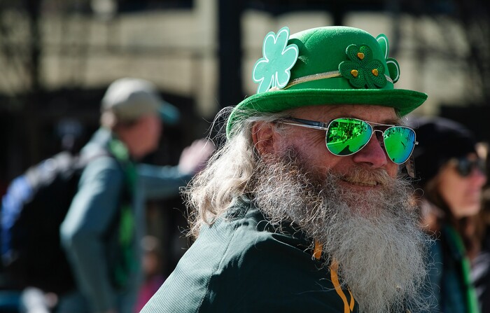 (Francisco Kjolseth | The Salt Lake Tribune) Carl Spitzmacher zips around on his bike as Salt Lake CityÕs Irish community celebrates their 41st annual St. PatrickÕs Day Parade with crowds lining up to take in the festivities. Marching bands, Irish dancers, bagpipes and a sea of green moved along 200 South, starting at 500 East Saturday morning en route to State street where the Siamsa festivities kept the fun going at the Gallivan Center.