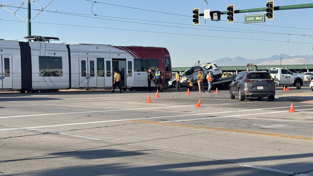 (Fox 13 Now) A TRAX train hit a car Friday morning in Salt Lake City.