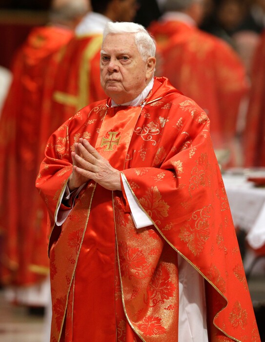 (AP Photo/Andrew Medichini, File) In this Tuesday, March 12, 2013, file photo, Cardinal Bernard Law attends a Mass for the election of a new pope celebrated by Cardinal Angelo Sodano, not pictured, inside St. Peter's Basilica, at the Vatican. Law died Wednesday.