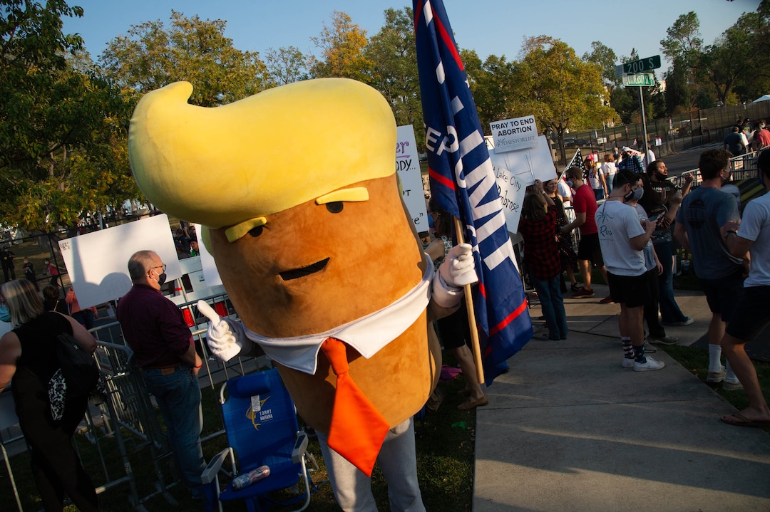 (Francisco Kjolseth  |  The Salt Lake Tribune) The Trump-tater joins supporters of President Donald Trump rally outside of Kingsbury Hall on the University of Utah campus in Salt Lake City on Wednesday, Oct. 7, 2020, before the vice presidential debate.
