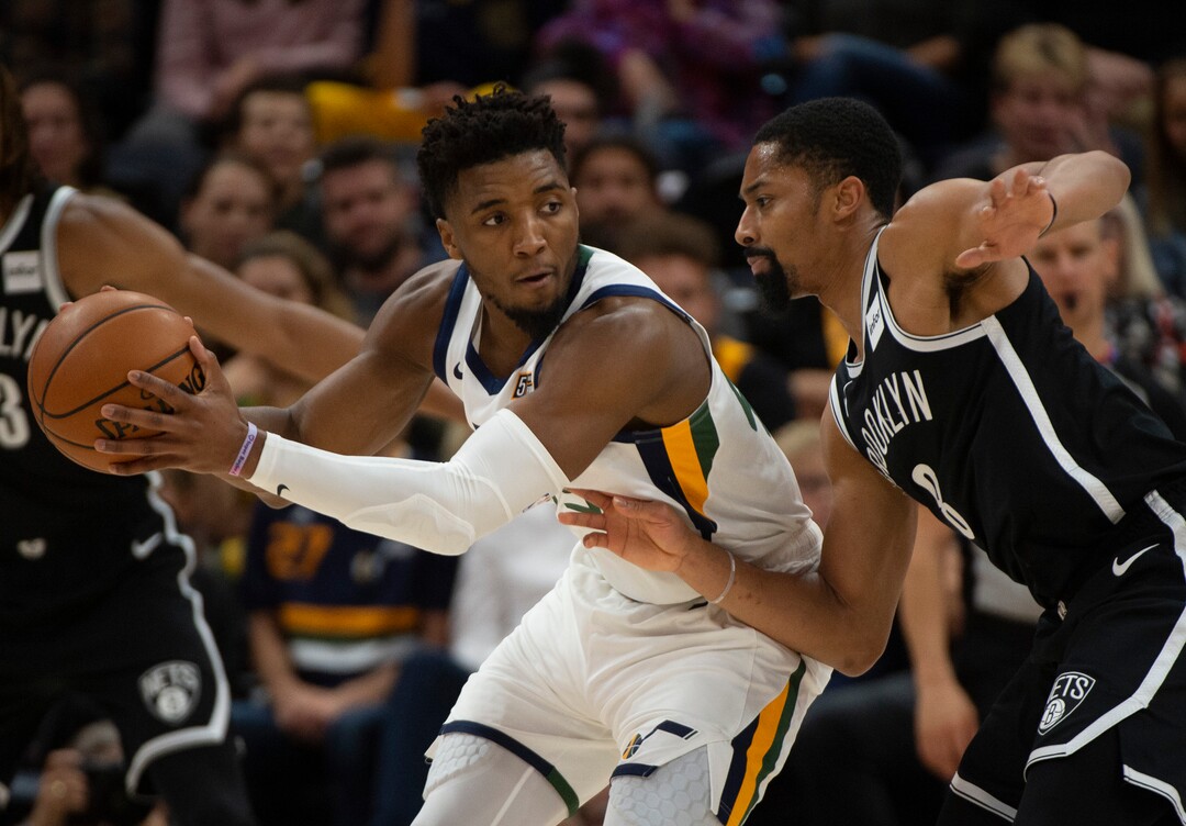 (Rick Egan  |  The Salt Lake Tribune)        Utah Jazz guard Donovan Mitchell (45) works the ball inside as Brooklyn Nets guard Spencer Dinwiddie (8) defends, in NBA basketball action between the Utah Jazz and the Brooklyn Nets in Salt Lake City, Tuesday, Nov 12, 2019.