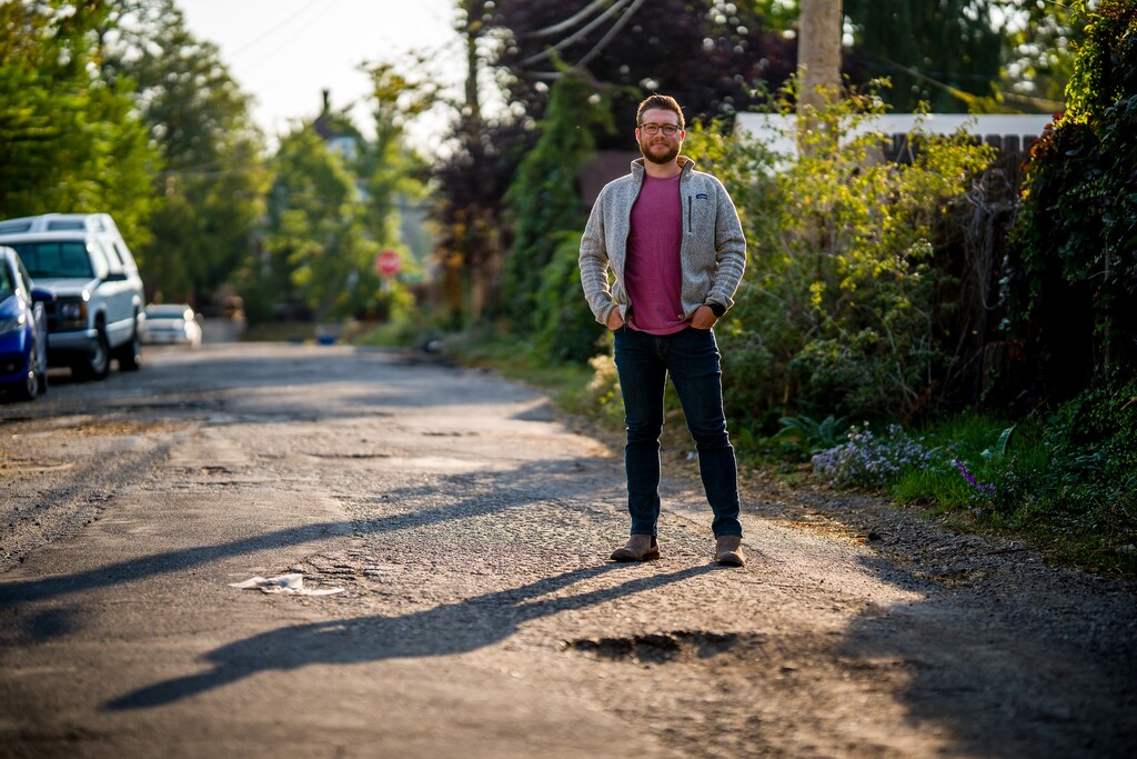 (Trent Nelson | The Salt Lake Tribune) Sam Helgren is frustrated that the city has stopped picking up garbage on his street, Fuller Avenue. It doesn't remove the snow. There's a dispute over who is responsible and Salt Lake City says it isn't the city. Monday, Sept. 27, 2021.