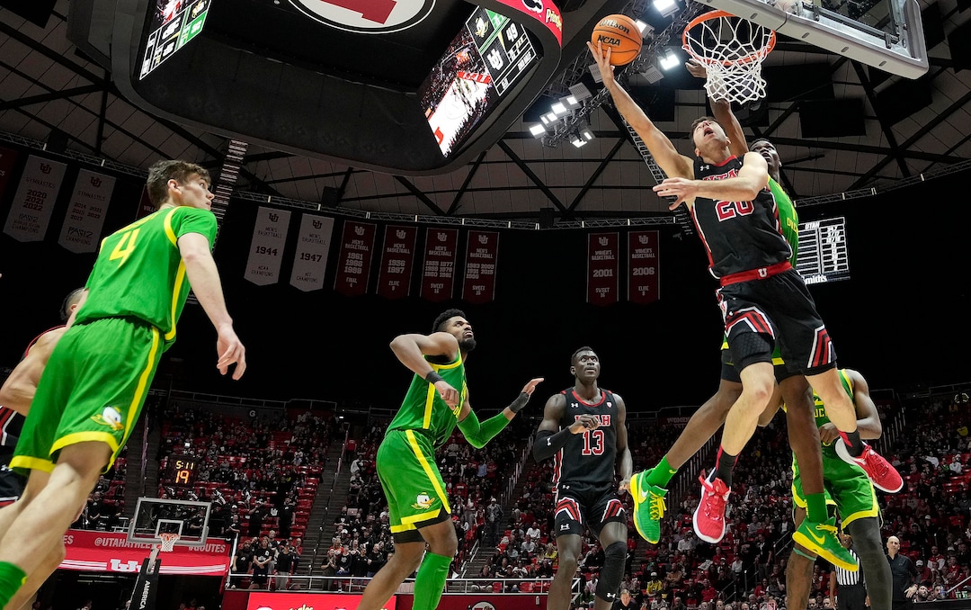 (Leah Hogsten | The Salt Lake Tribune) Utah Utes guard Lazar Stefanovic (20) for two as the University of Utah hosts Oregon at the Huntsman Center, Jan. 7, 2023.