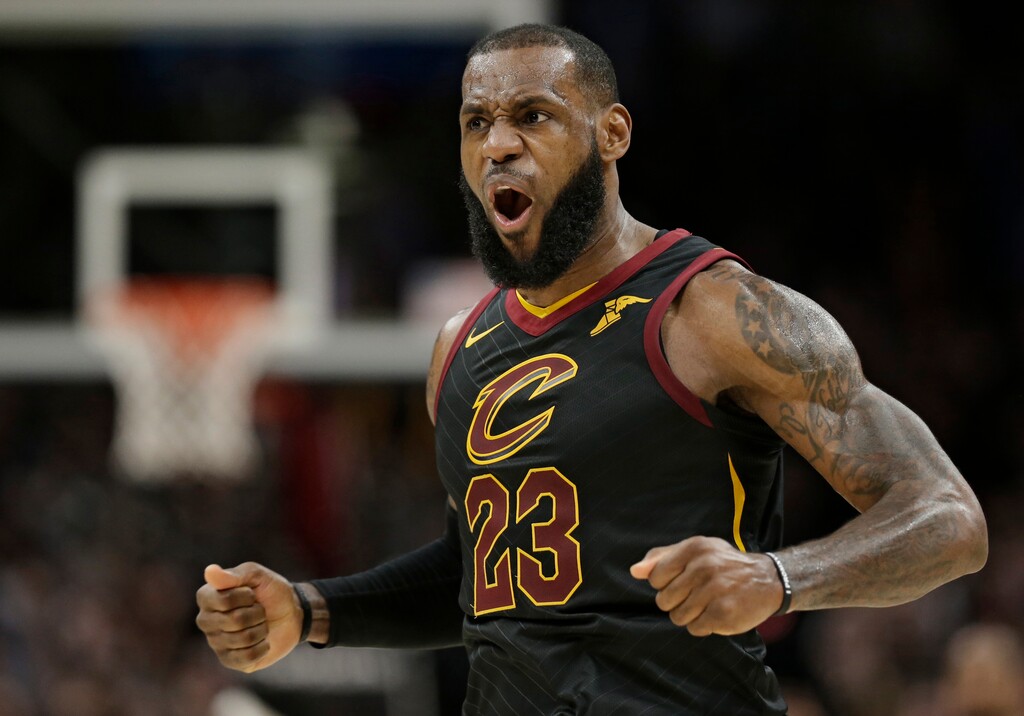 Cleveland Cavaliers' LeBron James celebrates after scoring in the second half of an NBA basketball game against the Sacramento Kings, Wednesday, Dec. 6, 2017, in Cleveland. The Cavaliers won 101-95. (AP Photo/Tony Dejak)