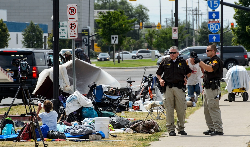 (Steve Griffin  |  The Salt Lake Tribune)  Law enforcement officers from several agencies increase their presence in the Rio Grand homeless area in Salt Lake City, on Monday August 14, 2017.