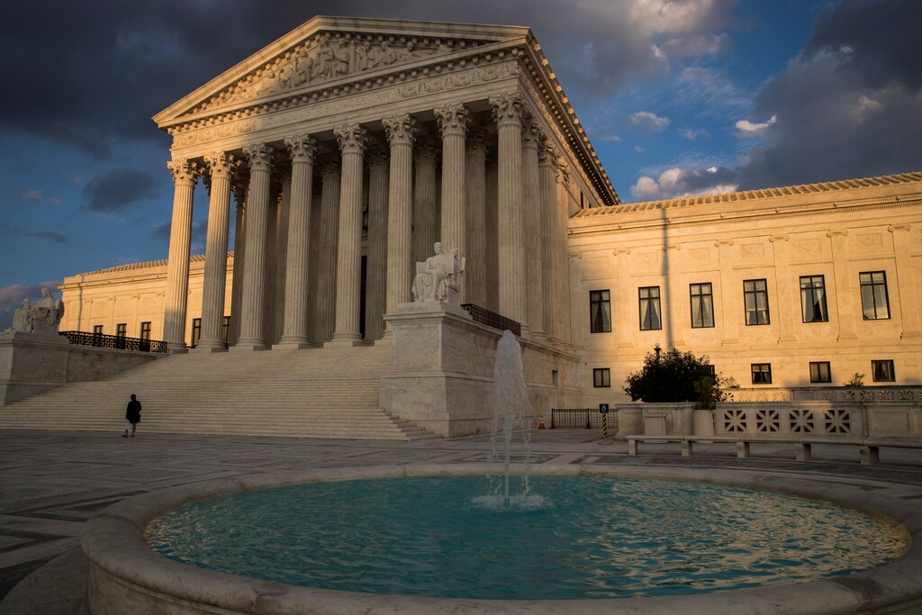 (J. Scott Applewhite | Associated Press file photo) In this Oct. 10, 2017 photo, the Supreme Court in Washington is seen at sunset. The Trump administration Thursday night took the unusual step of asking the Supreme Court to immediately review and overturn a judge's ruling that said the administration may not dismantle a program that provides work permits to undocumented immigrants raised in the United States.