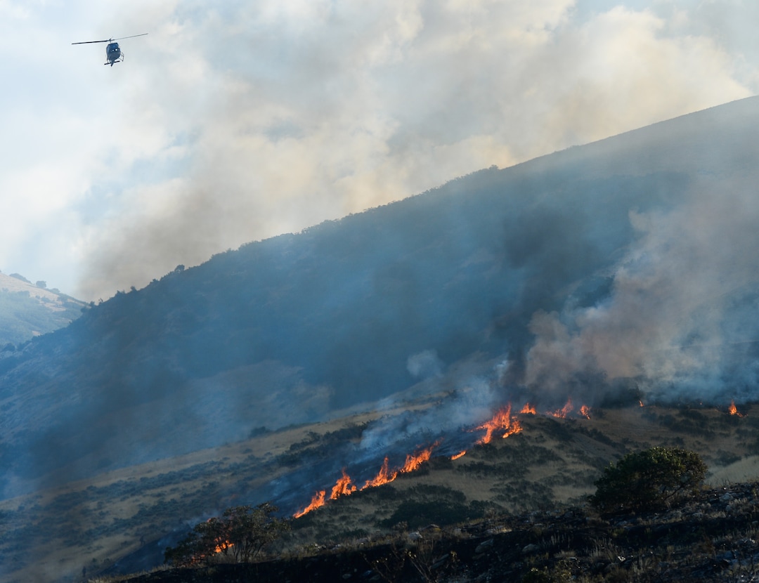 (Francisco Kjolseth  |  The Salt Lake Tribune)  Fire crews battle a fire in Davis County in Utah on the East Bountiful bench that grew to 150 acres early Friday morning, Aug. 30, 2019, and destroyed three homes. On Sept. 2, officials said the fire was 100% contained.