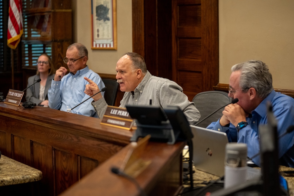 (Trent Nelson | The Salt Lake Tribune) Box Elder County commissioners Boyd Bingham, Tyler Vincent and Lee Perry discuss the data center project at a special meeting in Brigham City on April 27, 2026. The commission unanimously approved the project at a May 4 meeting at the Box Elder County fairgrounds to accommodate a large crowd.