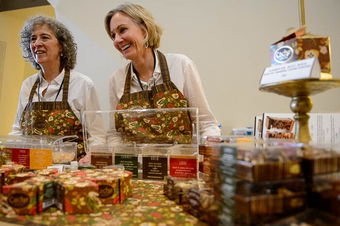 (Trent Nelson | The Salt Lake Tribune)
The 2018 Chocolate & Cheese Festival at the Natural History Museum of Utah in Salt Lake City, Sunday March 25, 2018. Bobbie Wolbach and Lori Darr hand out samples of toffee from Darr's Cache Toffee Collection.