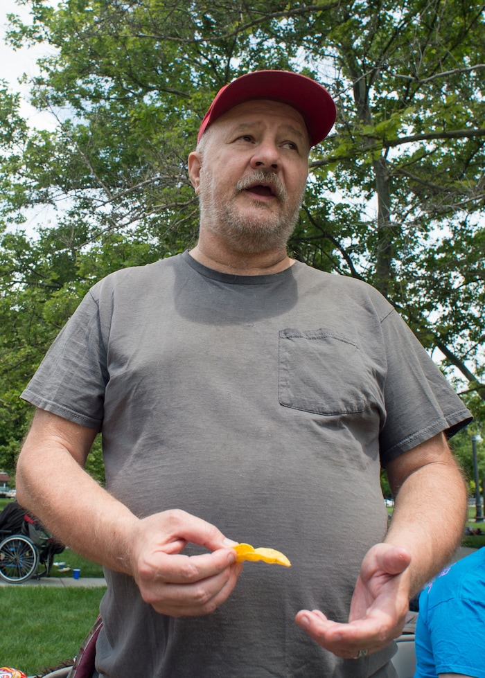 (Rick Egan  |  The Salt Lake Tribune)      
Sugar House residents, Janice and Derek Mullins, talk about how he met his wife, Janice three years ago this weekend, when they were both homeless. They returned to Pioneer park to visit friends, as the Salt Lake City Mission fed and donated clothes to the homeless in Pioneer Park on Memorial day, Monday, May 28, 2018.


