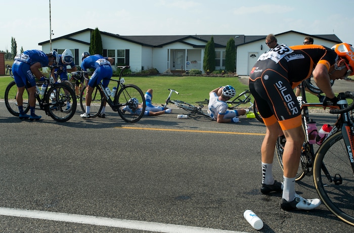 (Rick Egan  |  The Salt Lake Tribune)  Riders try to recover from a huge crash near Hooper, in the Tour of Utah Stage 5, Friday, August 4, 2017.


