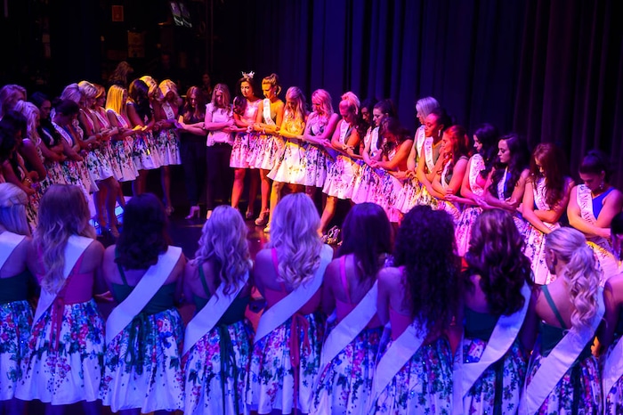 (Trent Nelson | The Salt Lake Tribune)
Contestants gather for a prayer before the curtain goes up at the Miss Utah pageant in Salt Lake City, Wednesday June 13, 2018.