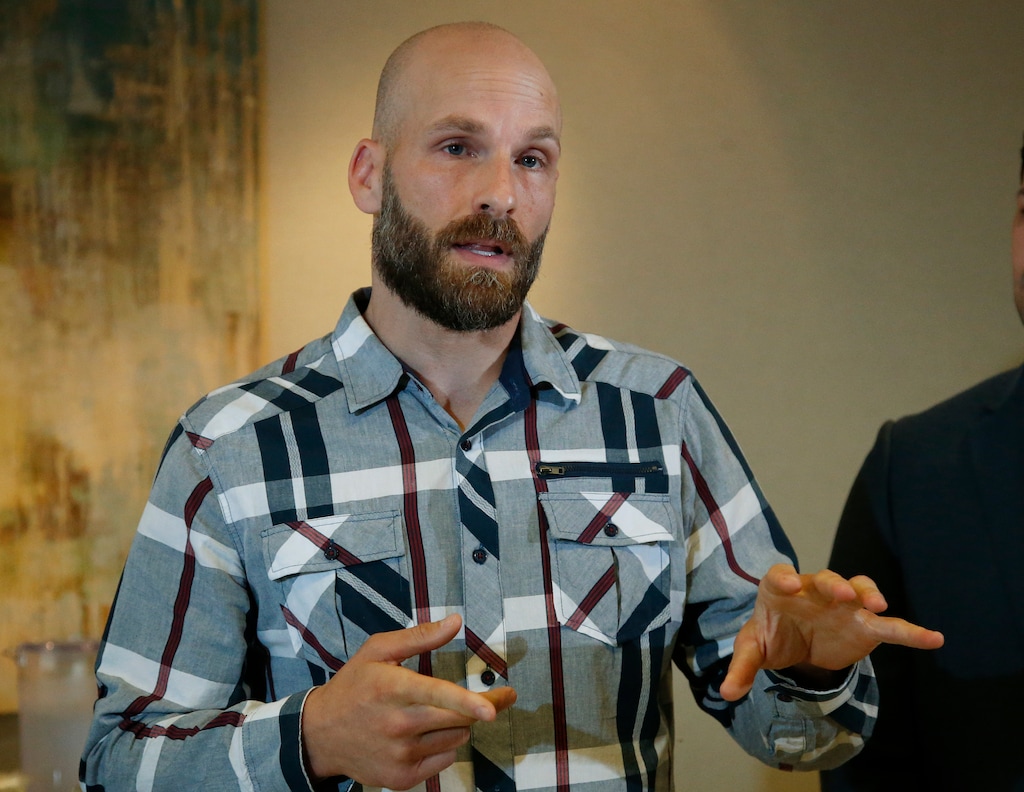 Michael Behenna answers a question during a news conference Wednesday, May 8, 2019, in Oklahoma City. Behenna has been pardoned from his 2009 conviction for killing an Iraqi prisoner. (AP Photo/Sue Ogrocki)