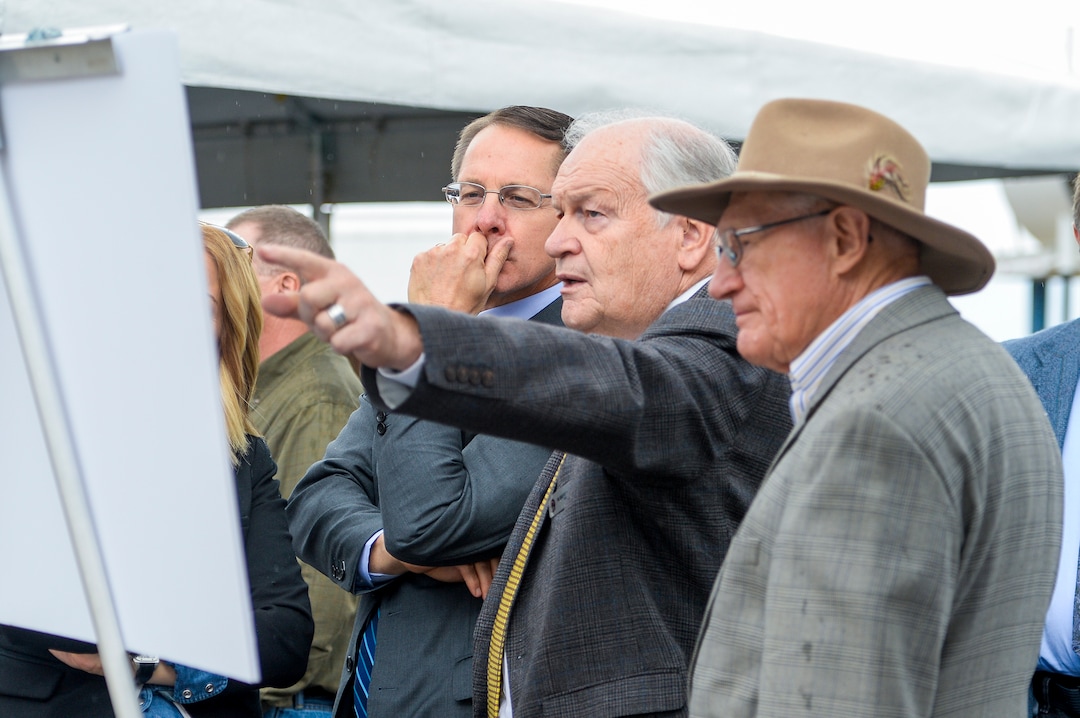 Leah Hogsten  |  The Salt Lake Tribune l-r  Ken Ivory, R-West Jordan listens as Middle mayor Robert Hale points out places on the master plan, Monday, Oct. 22, 2018. At right is former Midvale planning commission chairman, Allen Litster. Jordan Bluffs is moving forward with the View 72, Phase II development in Middle. The 265-acre parcel will be comprised of mixed-use development on the former Sharon Steel superfund industrial site.