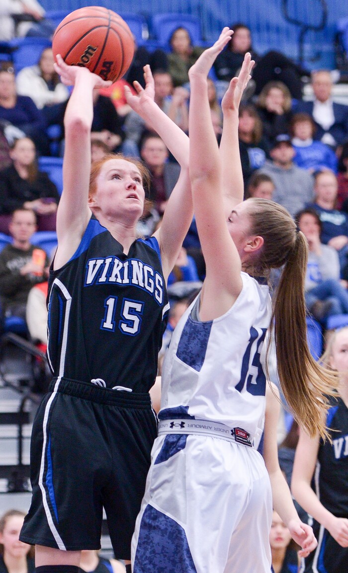 (Leah Hogsten  |  The Salt Lake Tribune)  Pleasant Grove's Andra Hancock aims for the net. Copper Hills High School girls' basketball team defeated Pleasant Grove High School 66-25 during their Class 6A girls' basketball playoff opener at Salt Lake Community College Tuesday, Feb. 20, 2018. 