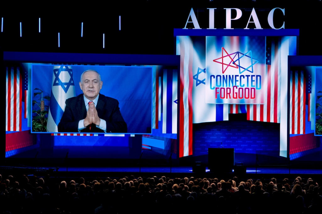 Israeli Prime Minister Benjamin Netanyahu speaks on a video from Israel to the 2019 American Israel Public Affairs Committee (AIPAC) policy conference, at Washington Convention Center, in Washington, Tuesday, March 26, 2019. (AP Photo/Jose Luis Magana)