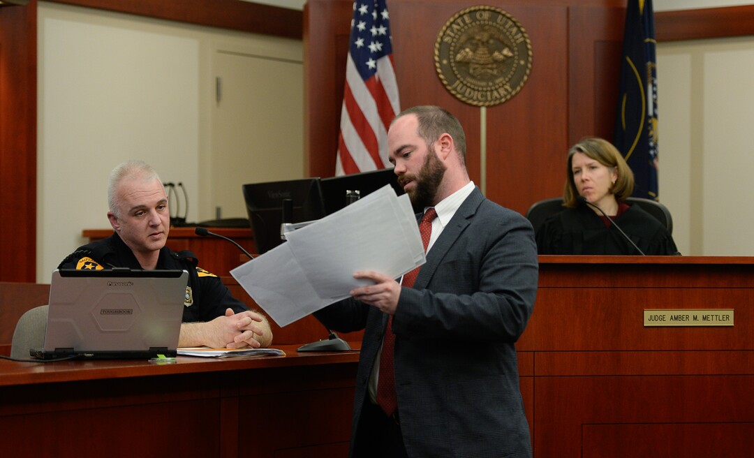 (Francisco Kjolseth  |  The Salt Lake Tribune)  Detective Justin Lancaster who specializes in collision reconstruction is cross examined by defense attorney Neil Webster with Judge Amber M. Mettler, at right, during a preliminary hearing on Monday, Jan. 8, 2018, for Shutney Kyzer, who on July 4, 2017, allegedly drove a car onto the sidewalk in downtown Salt Lake City, killing one homeless person, 27-year-old Kendra Griffis and injuring five others.