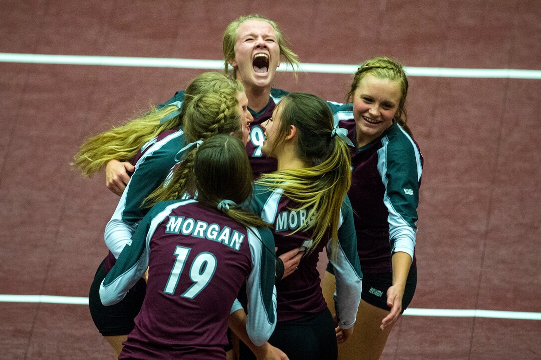 Chris Detrick  |  The Salt Lake TribuneMorgan's Brookelyn Hurlbut (22) Marcie Stapley (9) Brooke Loertscher (5) Ellee Anderson (1) Anna Cox (19) and Baylee Loertscher (6) celebrate after winning the first set during the Class 3A state volleyball championship match Thursday October 27, 2016. Morgan defeated Desert Hills 3-0. 