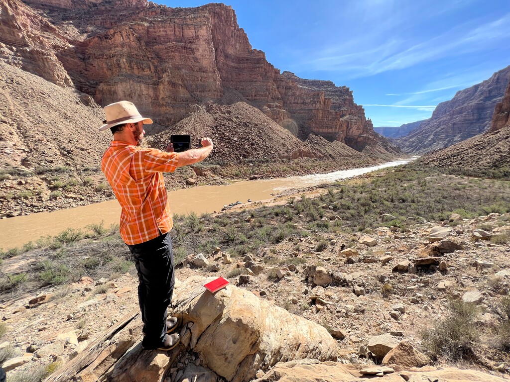 (Francisco Kjolseth | The Salt Lake Tribune) Seth Arens, a research scientist for Western Water Assessment, tracks changes in vegetation and eco systems occurring in areas where Lake Powell once was as he documents specific locations year after year including a spot near Water Hole Canyon.