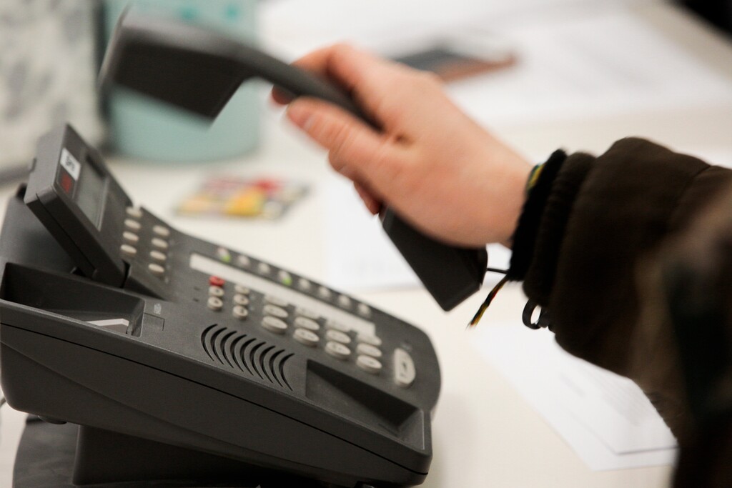 (AP file photo) A call center operator at the Utah County Health Department offices in Provo answers a call in January. Health officials in Salt Lake County warned Wednesday that recent customers of an Edible Arrangements store in Murray may have been exposed to hepatitis A.