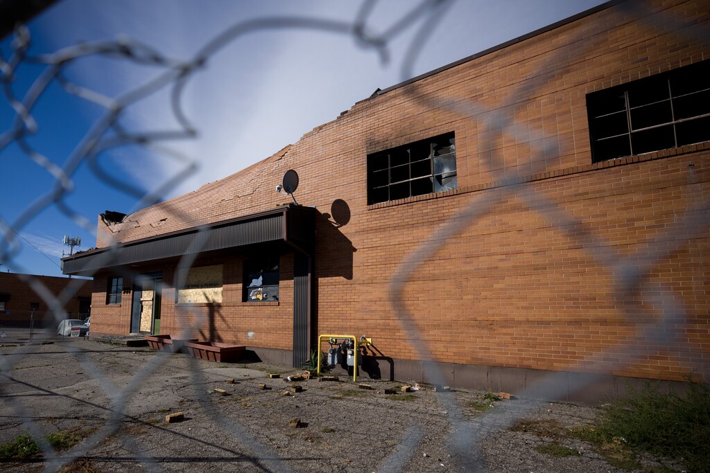 (Trent Nelson  |  The Salt Lake Tribune) A fire-damaged building that housed the manufacturing facility for Cali's Natural Foods, at 980 South 700 West in Salt Lake City on Tuesday, Oct. 14, 2025.