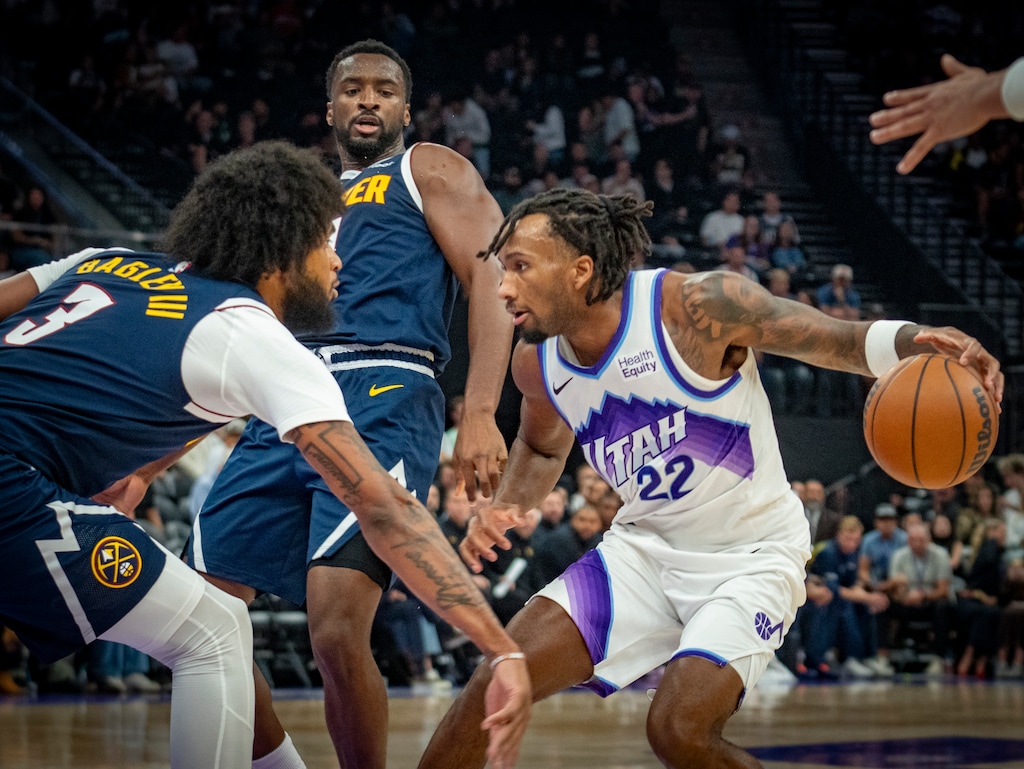 (Rick Egan | The Salt Lake Tribune)Utah Jazz guard Darryn Peterson (22) takes the ball up the middle as Denver Nuggets forward Marvin Bagley III (3) defends, in NBA preseason action between the Denver Nuggets and the Utah Jazz at the Delta Center on Monday, Oct. 5, 2026.Utah Jazz 