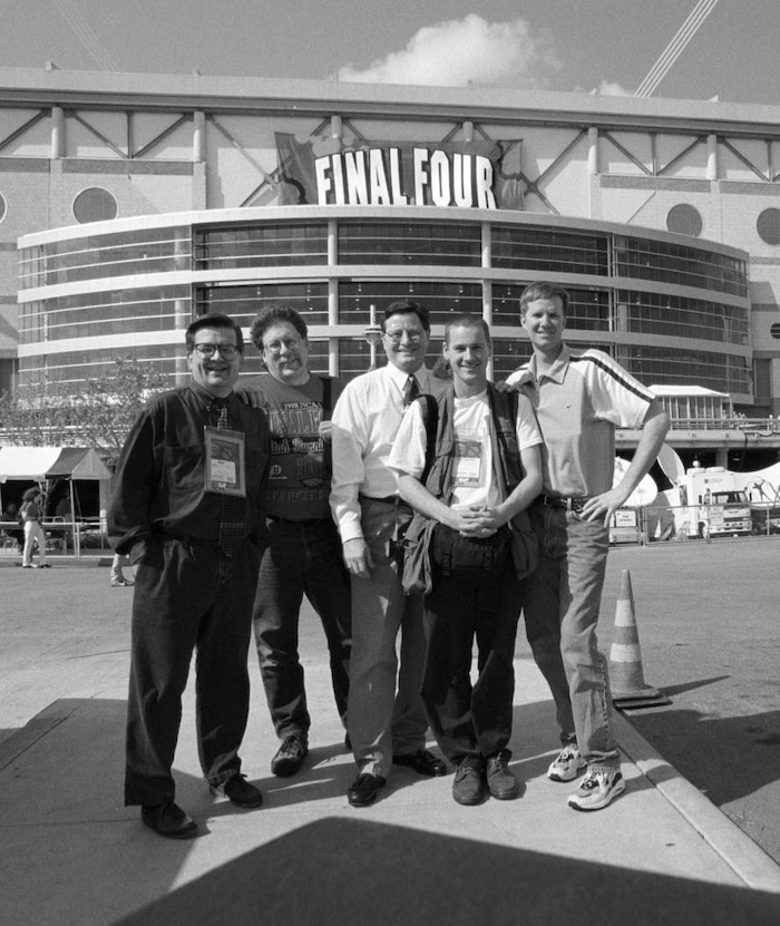 (Steve Griffin  |  Tribune file photo)  Tribune staffers Steve Luhm, Robert Kirby, Dick Rosetta, Trent Nelson and Steve Griffin in front of the Alamodome in San Antonio, Texas, the site of the 1998 Final Four championship.