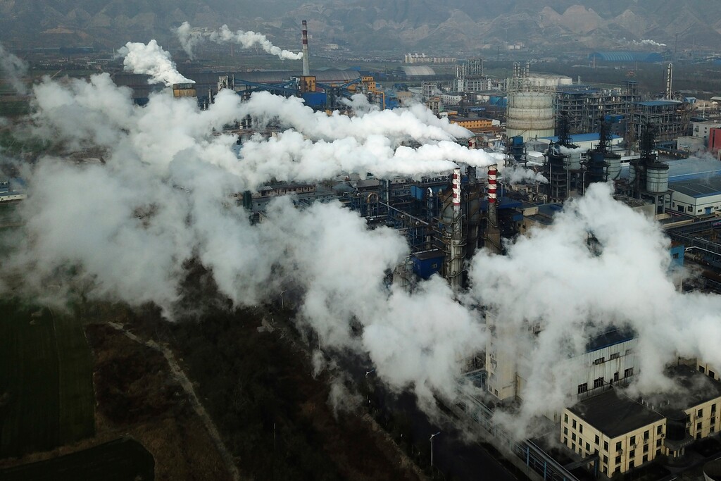 (Sam McNeil | AP file photo)

In this Nov. 28, 2019, photo, smoke and steam rise from a coal processing plant in Hejin in central China's Shanxi Province. Chinese President Xi Jinping says his country will aim to stop pumping additional carbon dioxide, the main global warming gas, into the atmosphere by 2060. Xi's announcement during a speech Tuesday, Sept. 22, 2020, to the U.N. General Assembly is a significant step for the world's biggest emitter of greenhouse gases and was immediately cheered by climate campaigners.