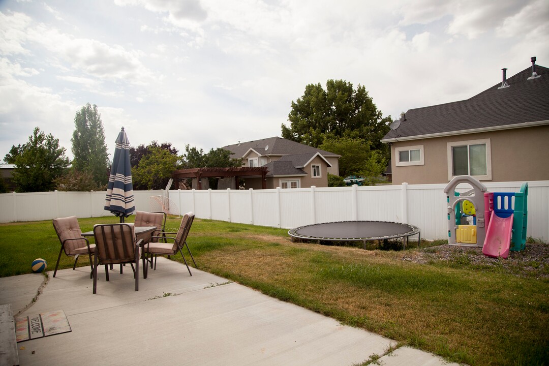 (Stella Yu |  The Salt Lake Tribune) Built in 2003, the 2,513-square-foot two-story home in Lehi comes with three upstairs bedrooms, two and a half baths, a kitchen, a family room and two dens with an open floor plan. The house also includes a two-car garage and space for RV parking.