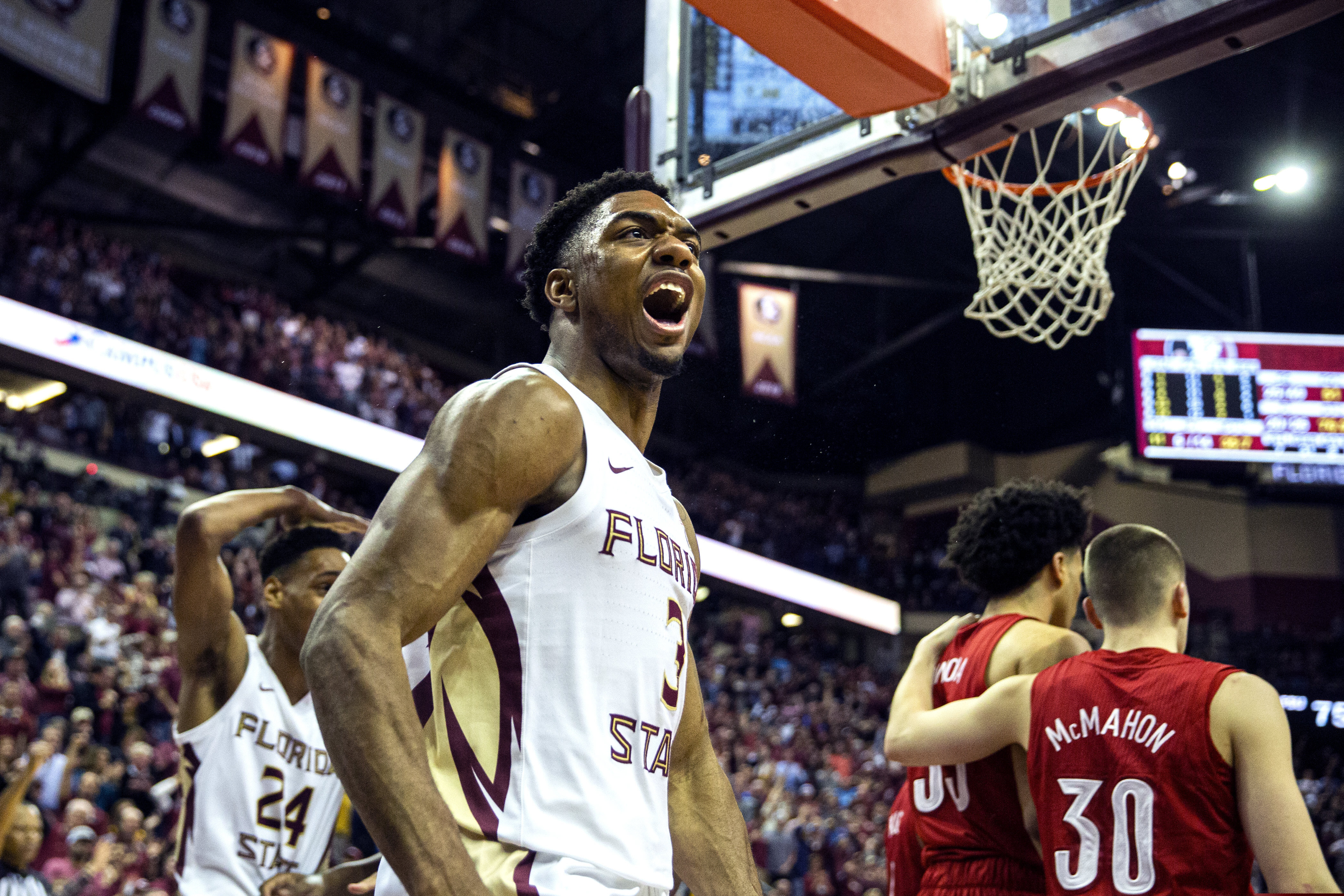 Florida State guard Trent Forrest (3) reacts to a dunk late in the second half of an NCAA college basketball game against Louisville in Tallahassee, Fla., Monday, Feb. 24, 2020. (AP Photo/Mark Wallheiser)