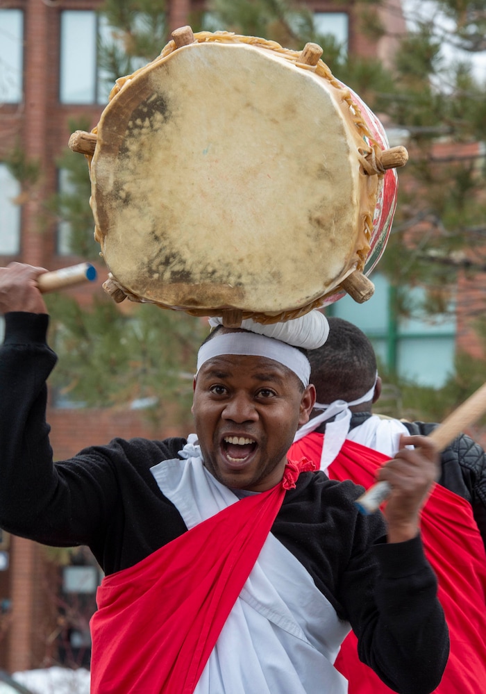 (Rick Egan  |  The Salt Lake Tribune)     The Alex Ngendakuriyo performs with the Jambo Africa Burundi Drummers, at the Sundance bonfire community gathering on Swede Alley, in Park City, Thursday, Jan. 30, 2020.